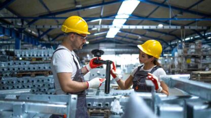 workers-checking-parts-manufactured-factory