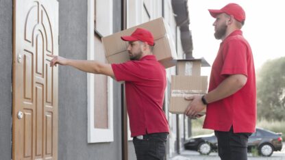 front-view-delivery-man-with-packagaes-4