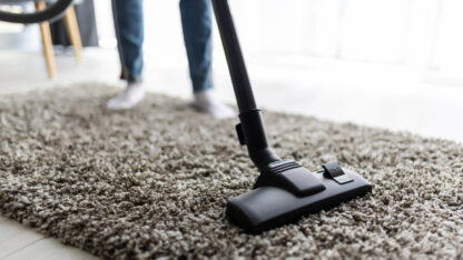 Professional-carpet-cleaning-machine-cleaning-living-room-carpet