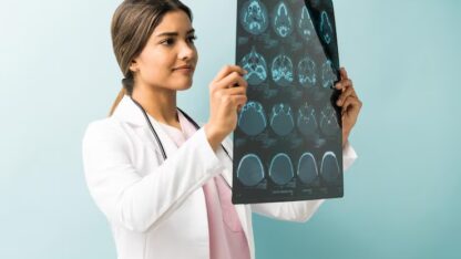 imgi_2_beautiful-female-doctor-examining-xray-while-standing-studio_662251-456